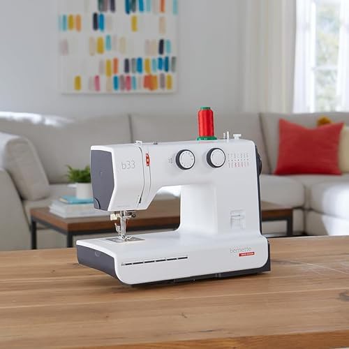 Swiss designed mechanical sewing machine with extra bobbins — photo 3