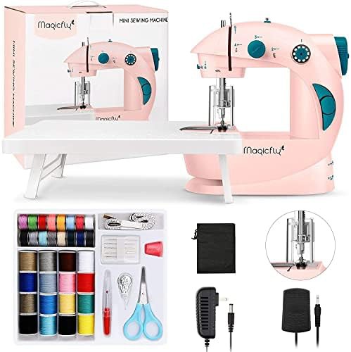 Pink mini sewing machine with accessories