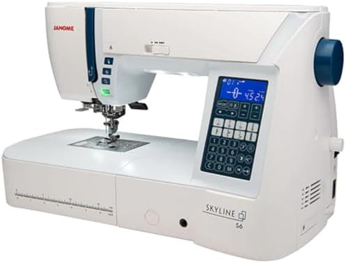 Mid-size white computerized quilting sewing machine — photo 4